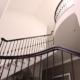 Dark coloured timber handrail with Black steel spindles