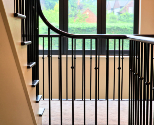 Seamless alignment of handrails with concrete stairs.