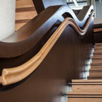 Bespoke clover hardwood handrails at university of Essex, CNC manufactured, hand finished oak
