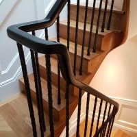 Swan neck with 180 wreath Black Walnut handrails with cast bamboo spindles