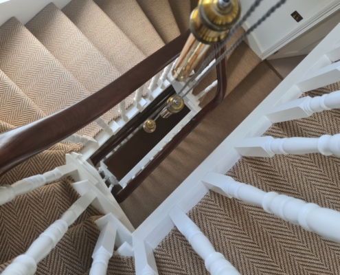 Traditional and beautiful Client's brief Continuous Sapele handrails Spindles Custom-made bun shape 5 axis CNC machines French polished Bespoke newel cap Turned spindles Prime coated Tenoned New cut string staircase Craftsman On-site installation Balustrade Ground to second floor No newel posts No steel reinforcement Delighted client Expert chippie Impressed