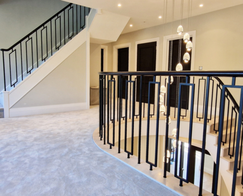 Faircross curved balustrade handrail staircases clad in stone balustrade spindle design Ash wooden handrail