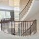 Landing steel balustrade with Black Walnut curved handrail