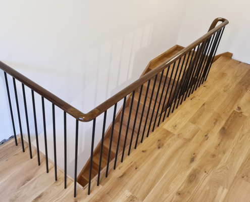 Ruislip hallway timber staircase handrail and balustrade sapele handrails French polish stain Contemporary balustrade and handrail