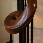 Notting Hill, residential project, custom made timber handrails, twisted steel spindles, no core rail, stone cladding, sapele handrails, staining, French polishing, satin sheen.