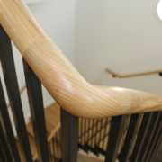 Handrail Creations Oak mopstick handrail Oxford University New college building Steel staircase Bronze balusters Clear lacquer Metal fabricators Beard Construction Roof terrace.