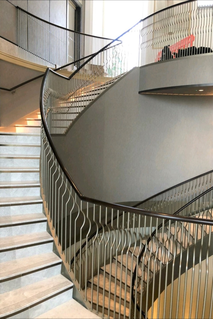 handrail fitting, London, timber handrail, Grade I listed property, luxury apartments, bespoke steel staircase, balustrade, Canal Engineering, 5 axis CNC machines, pre-join, French polishing, staining, lacquer finish.