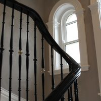 Continuous handrail in Black with matching coloured balustrade