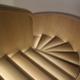 Curved staircase with Oak cladding and handrails