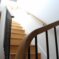 90 degree wreath, Oak handrail to Black spindles with drilled holes