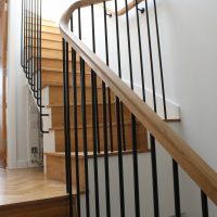 Oak handrails with steel Black rounded spindles