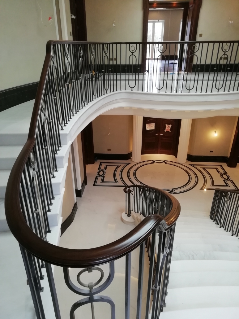 Handrail Creations, bespoke handrails, Sapele, landmark projects, helical staircase, circular galleries, double-fantail staircase, 5-axis CNCs, steel core rail, contemporary balustrade, LED lighting.