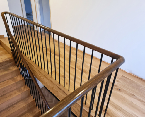 Ruislip hallway timber staircase handrail and balustrade sapele handrails French polish stain