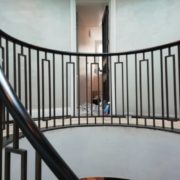 Handrail Creations bespoke European Oak handrails Millbank development Westminster luxury apartments curved handrails curved staircases penthouses core staircases custom made steel balustrade Spiral UK architectural metalworker residential development swimming pool cinema room 24 hours concierge