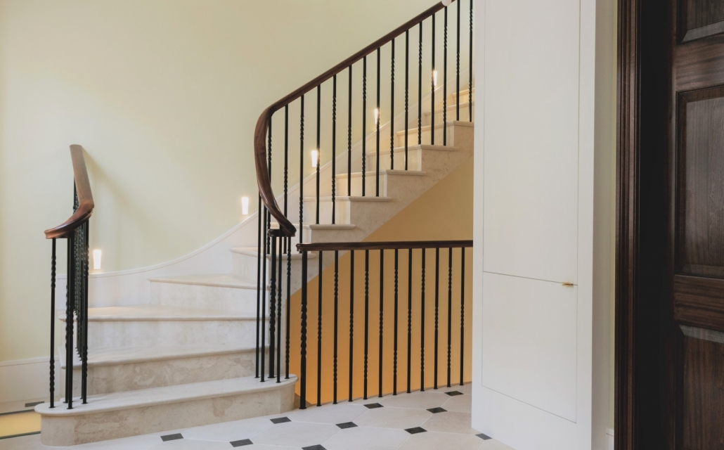Notting Hill, residential project, custom made timber handrails, twisted steel spindles, no core rail, stone cladding, sapele handrails, staining, French polishing, satin sheen.
