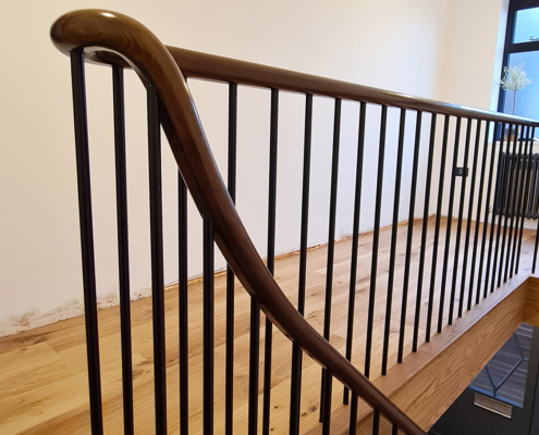 Ruislip hallway timber staircase handrail and balustrade sapele handrails French polish stain