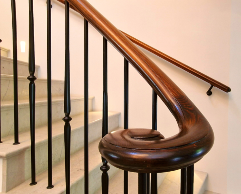 Top Park Gerrards Cross Project Private client Handrails Spindles American Ash Intricate mould Crafted Circular landings Powder-coated cast steel spindles Luxury properties French polished Stained Specific shade Interior design Exquisite internal finishes Work of art Complements Client feedback Graceful Complete Appreciated