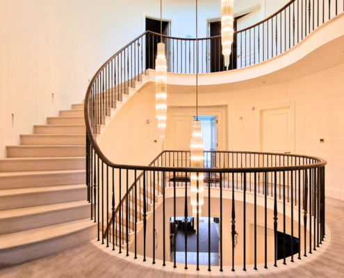 Custom European Oak Handrail for Cantilever Stone Staircase