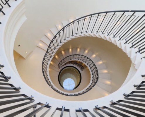 Winnington Road helical staircase North London steel spindles stairs handrail wooden handrail steel balustrade stone staircase