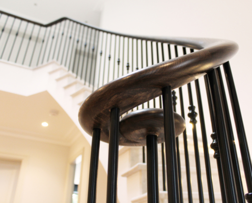 Dartnell curved wooden handrails wooden handrails spindles balustrade staircase Ash stained velvet black finish handrail Curved wooden handrails and spindles on stone-clad concrete staircase Custom made balustrade on curved concrete staircase Ash timber handrails and steel spindles with decorative collars Dark stained Ash handrails in contrast to painted joinery work Powder coated black balustrade pickets Chemically fixed spindles into handrail No core rail or welding required Installation of balustrade and handrail Self build project with remarkable results Testimonial from satisfied client